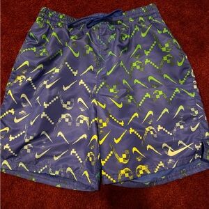 Men’s small Nike swim mesh lined blue shorts S small all over print swoosh